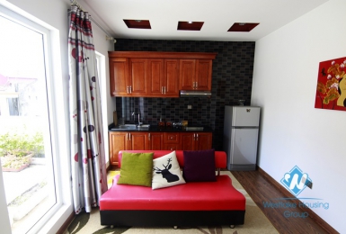 Bright and Fully Furnished One Bedrooms Apartment for rent in Doi Can st, Ba Dinh district.